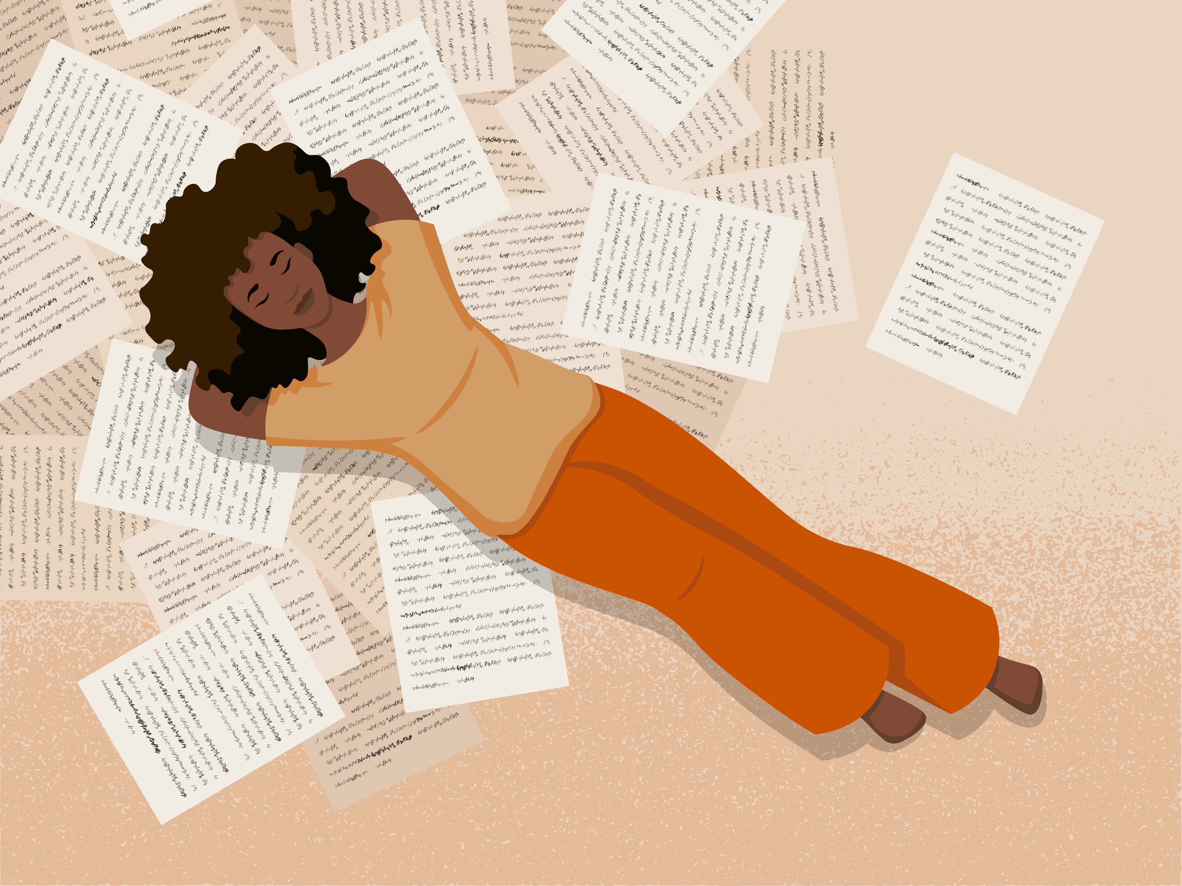 A writer resting on a spread of their published pages